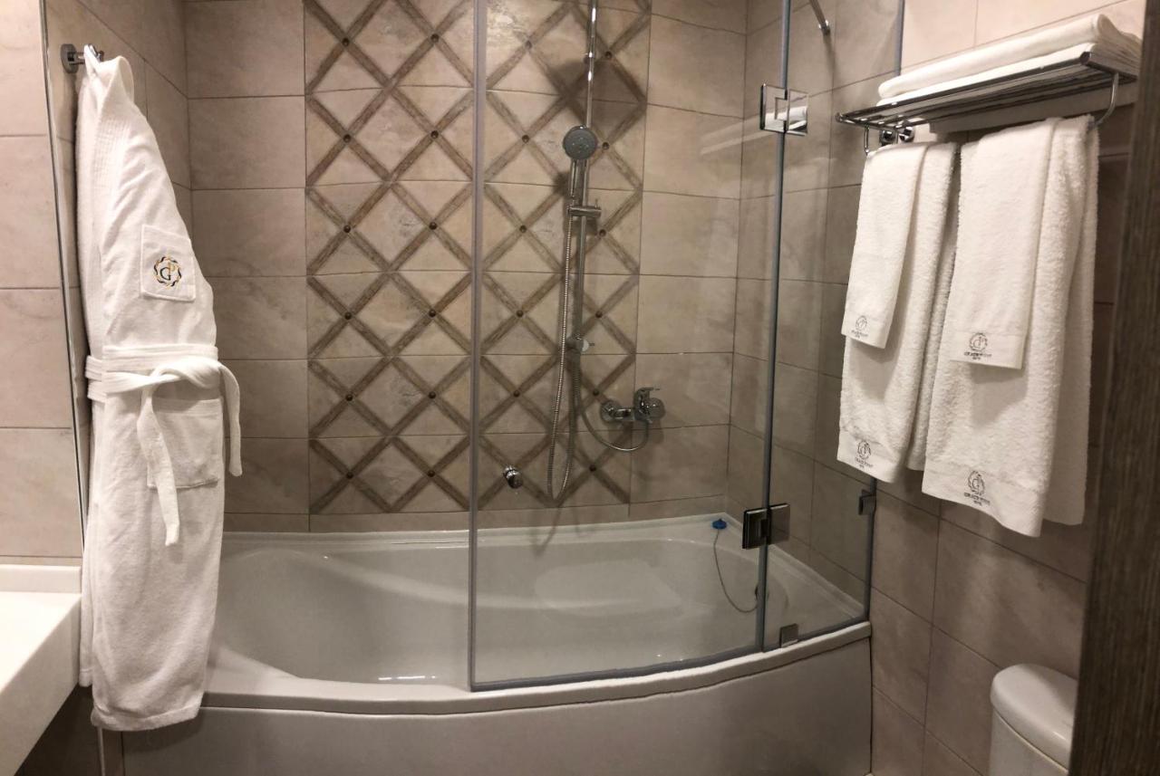 Grace Point Hotel Астана Стая снимка