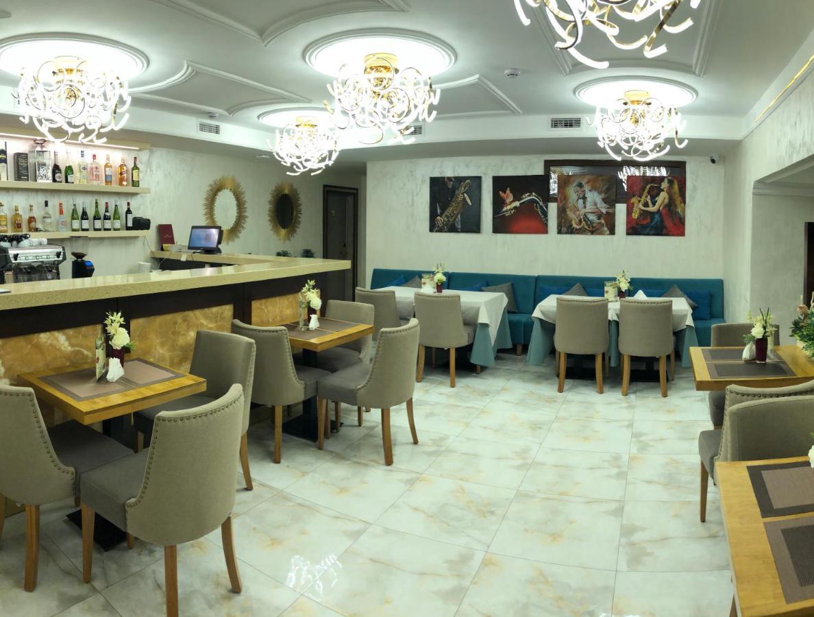 Grace Point Hotel Астана Стая снимка