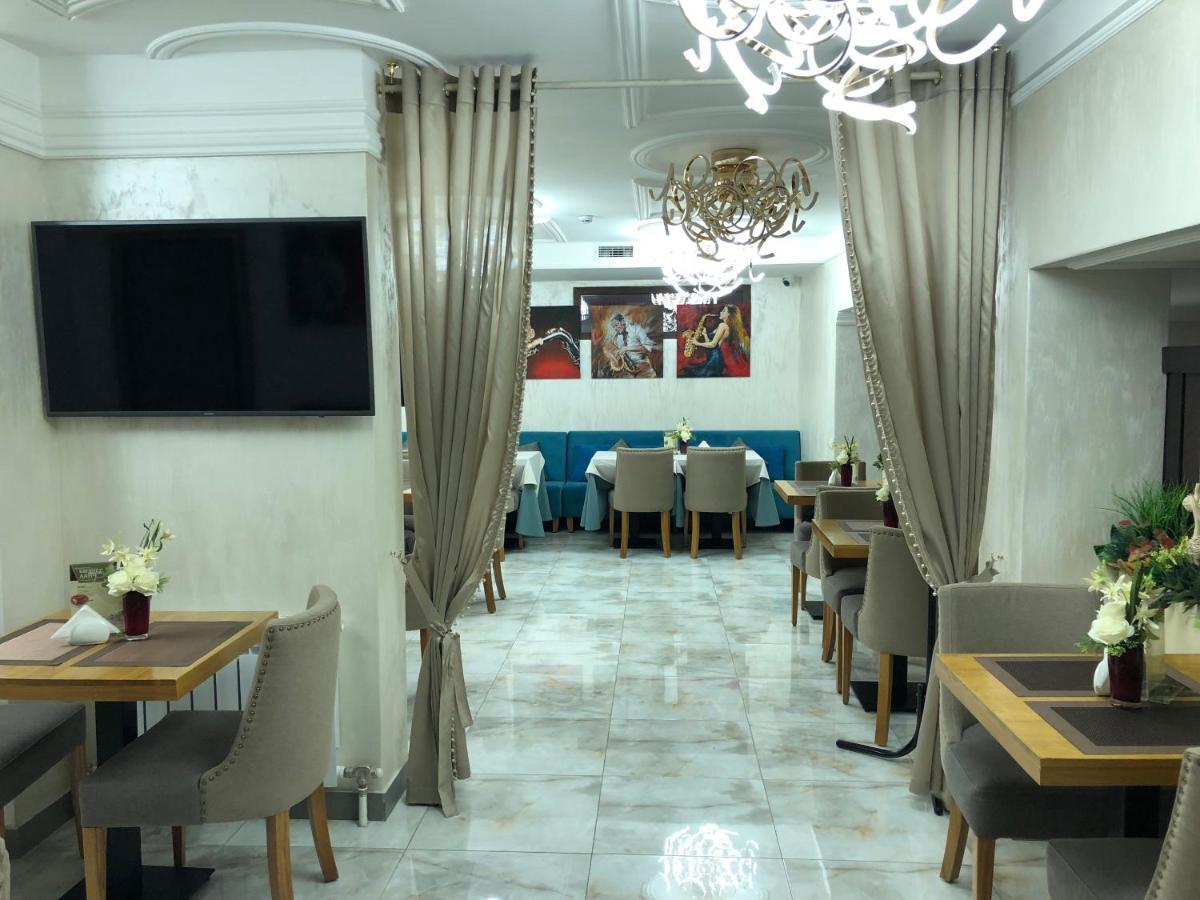 Grace Point Hotel Астана Стая снимка